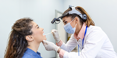 Medical team discussing patient care in hospital corridor