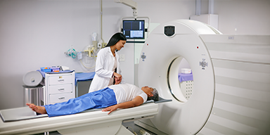 Medical team discussing patient care in hospital corridor